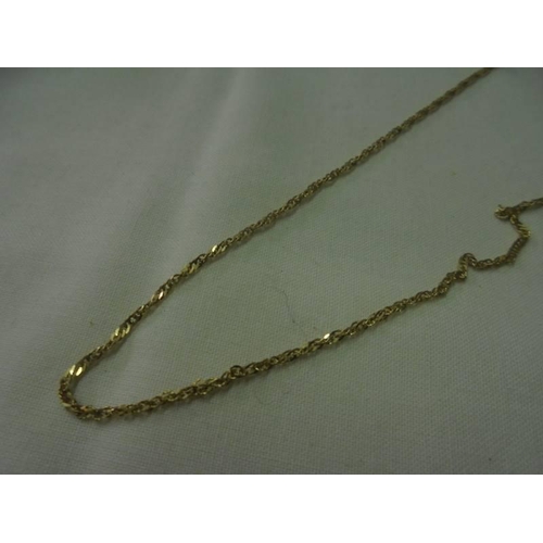 82 - A 9ct gold fine chain, 20