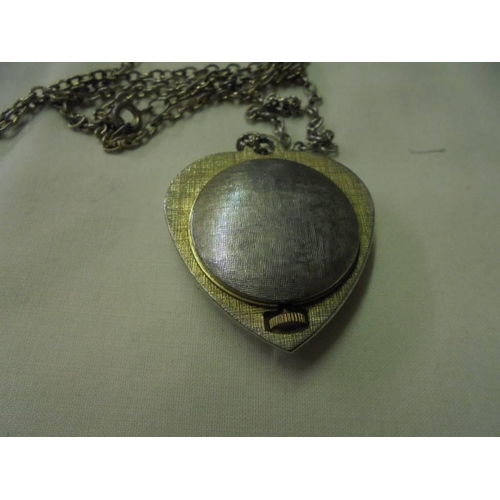153 - A vintage Lucerne Swiss made pendant watch on chain, in working order.