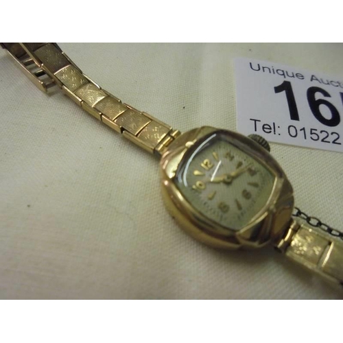 165 - A vintage Eversly ladies gold wrist watch, 15.8 grams.