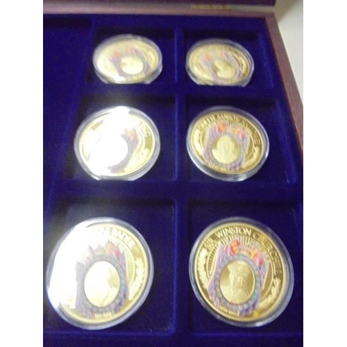 209 - A cased set of Heroes of WW2 gold plated coins with certificate.