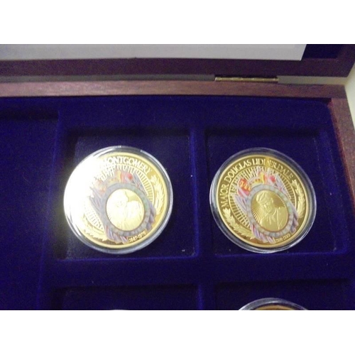 209 - A cased set of Heroes of WW2 gold plated coins with certificate.