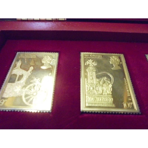 210 - A limited edition coronation issue of gold plated solid silver stamp dies (4959 of 5000), issued by ... 