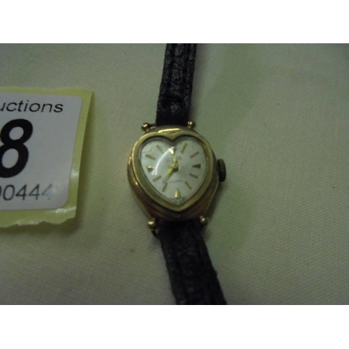 168 - A heart shaped gold Everite ladies wrist watch.