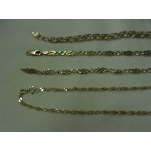 91 - A gold neck chain and three gold bracelets, 10 grams in total.