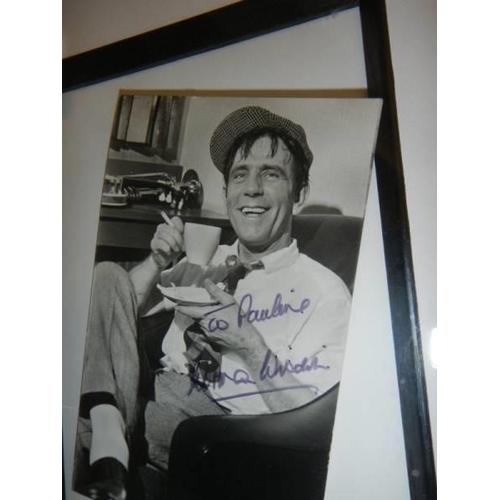 608 - A signed photograph of Norman Wisdom inscribed 'To Pauline'