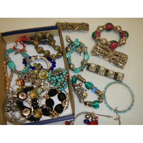 613 - A quantity of mainly bracelets and bangles etc.,