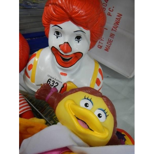 632 - A Ronald McDonald money box and two Mcdonald figures (plastic head and soft body) from '97 collectio... 