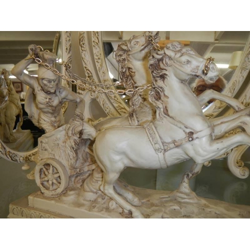 639 - A composite figure of a Roman chariot with horses.