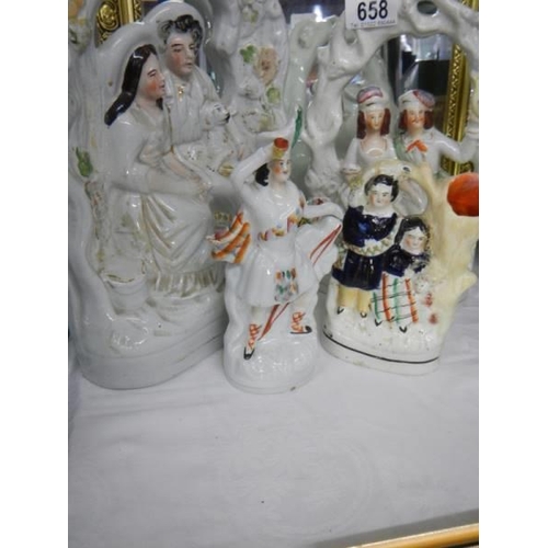 658 - 19th century Staffordhire figures being two courting couples and two others.