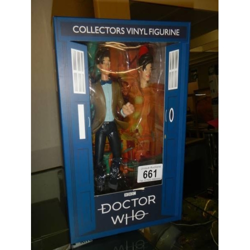 661 - A boxed Doctor Who figure of the 11th Doctor (Matt Smith) with interchangable head with fez.