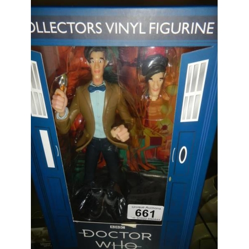 661 - A boxed Doctor Who figure of the 11th Doctor (Matt Smith) with interchangable head with fez.