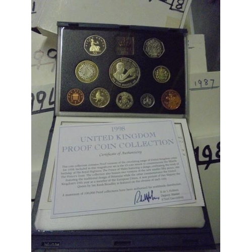 216 - Twenty nine sets of Coinage of Great Britain and Northern Ireland 1970-1998 and a 2000 UK proof set ... 