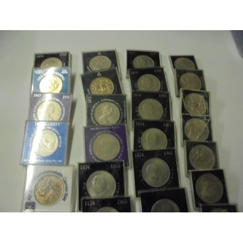 223 - Approximately 45 commemorative coins including Royalty, Churchill etc.,