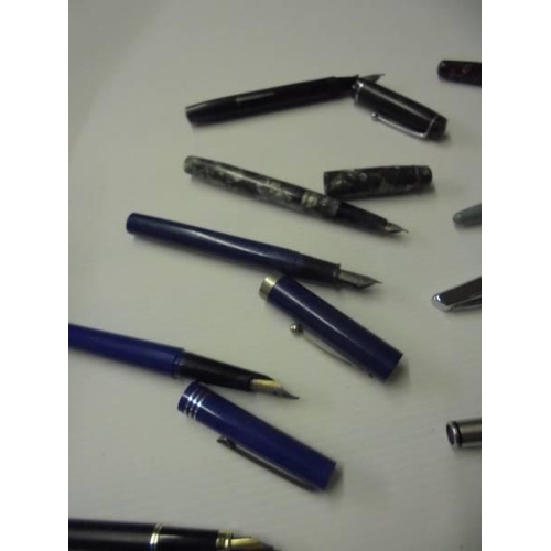 229 - Twelve assorted fountain pens including Shaeffer, Waterman, Soennecken etc.,