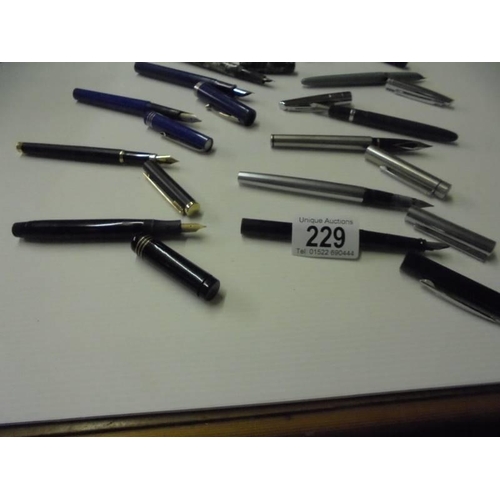 229 - Twelve assorted fountain pens including Shaeffer, Waterman, Soennecken etc.,