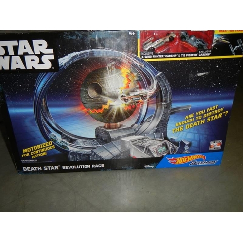 692 - A boxed Star Wars Hot Wheels 'Death Star Revolution Race'