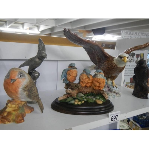 697 - A mixed lot of bird figure including Coalport Robin, County artists baby Kingfisher, Beswick Golden ... 