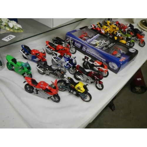 726 - A good lot of boxed and loose model motor cycles.