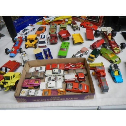 735 - A box of playworn and boxed diecast including Triang, Matchbox, Corgi etc.,