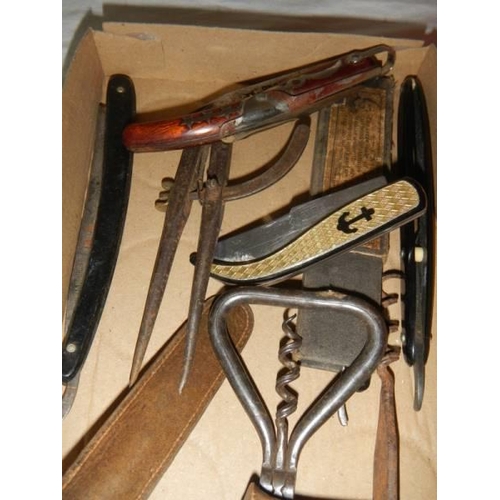 775 - A quantity of old cut throat razors etc.,