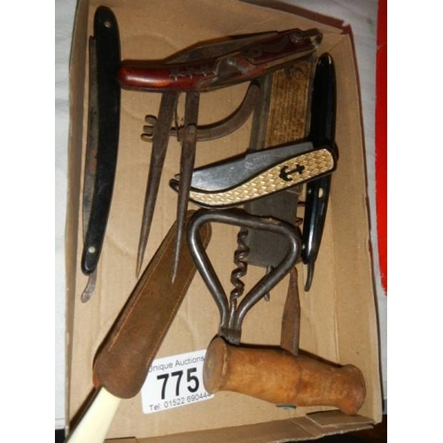 775 - A quantity of old cut throat razors etc.,