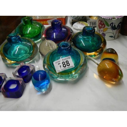 788 - A quantity of studio glass bud vases etc.,