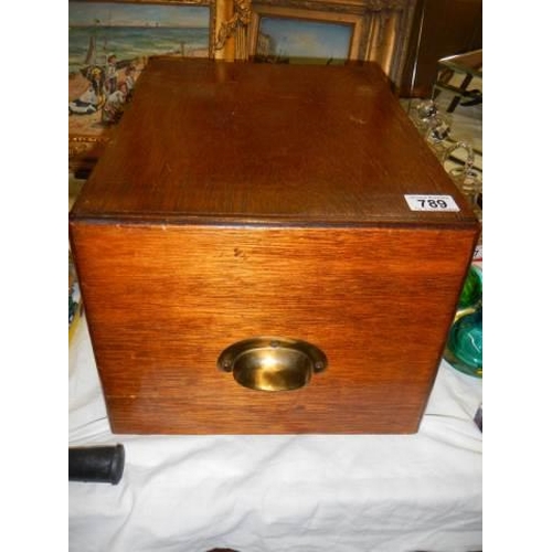 789 - A vintage oak filing drawer.