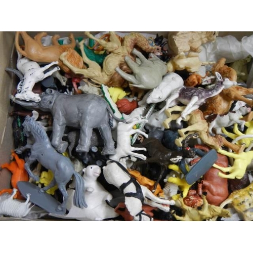 796 - A box of in excess of 200 vintage plastic farm animals.