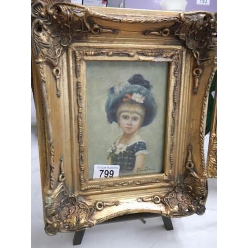 799 - An ornate gilt framed study of a child, frame 25 x 30 cm, image 11.5 x 17cm. COLLECT ONLY.