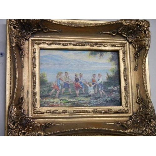 806 - A small ornate gilt framed study of children at play signed T Wilson, 30 x 15 cm, COLLECT ONLY.