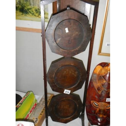 814 - A 1930's oak three tier cake stand, COLLECT ONLY