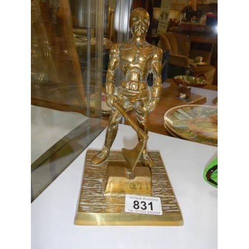 831 - A solid brass figure of an executioner..