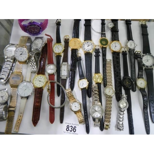 836 - Approximately twenty five assorted wrist watches.