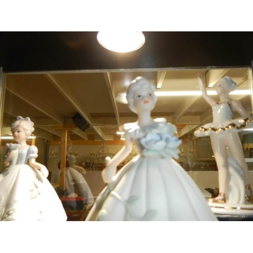 839 - Three boxed hand painted porcelain figures including a ballerina.