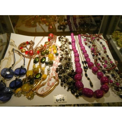 844 - A quantity of beads and necklaces.