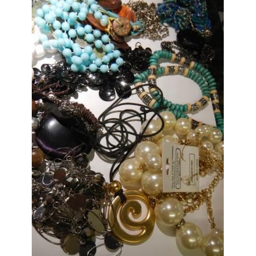 848 - A mixed lot of necklaces etc.,