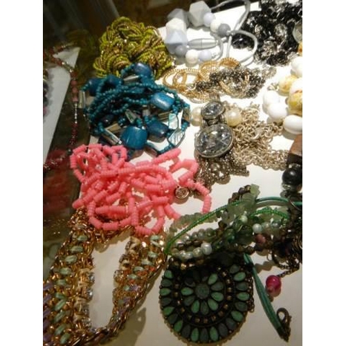 848 - A mixed lot of necklaces etc.,