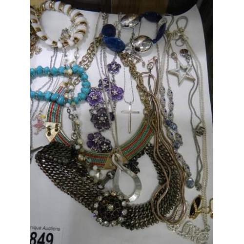 849 - A mixed lot of necklaces etc.,