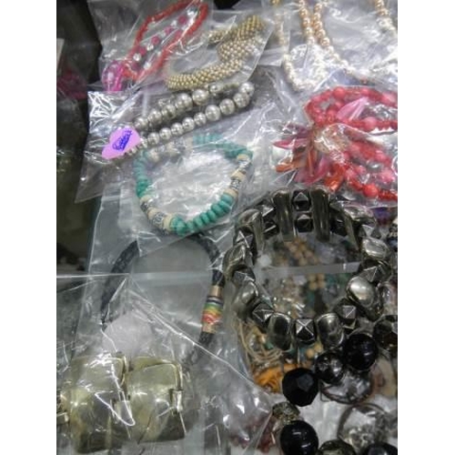 861 - Approximately twenty bracelets etc.,