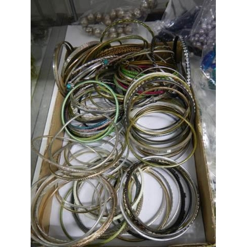 863 - A good lot of bracelets, bangles and necklaces.