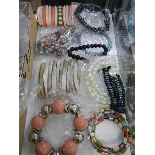 873 - A good lot of bracelets and necklaces.