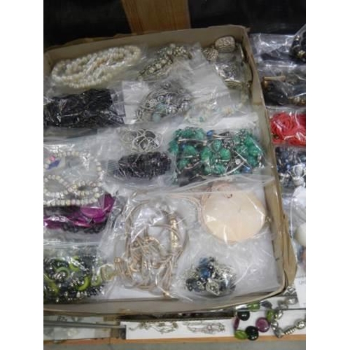 874 - Approximately twenty five necklaces and bracelets.