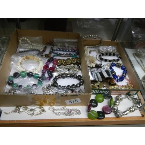 875 - Approximately twenty five necklaces and bracelets.