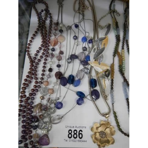 886 - A good lot of necklaces etc.,