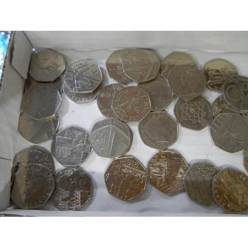 888 - A collection of thirty 50p coins including Beatrix Potter, Paddington etc.,