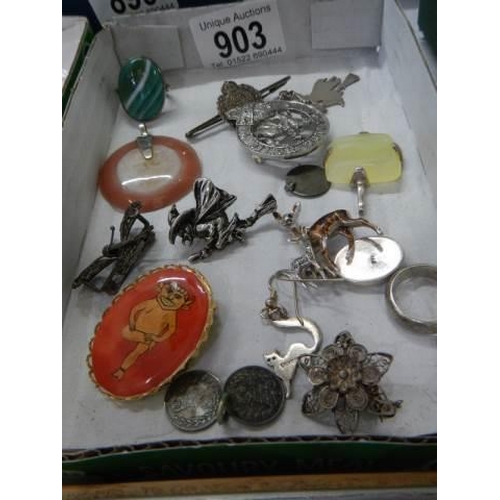 903 - A mixed lot of brooches, pendants etc.,