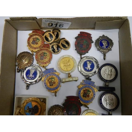 916 - A good mixed lot of badges and medallions.