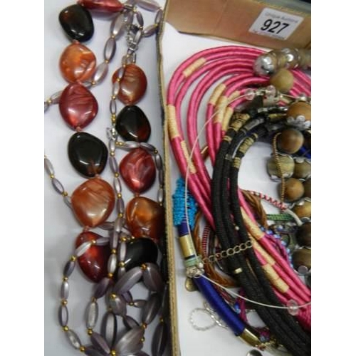 927 - A mixed lot of costume jewellery etc.,