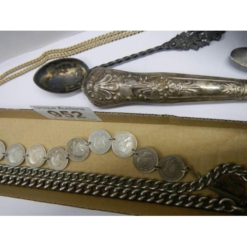 952 - A mixed lot of silver items including chains, coin bracelet etc.,