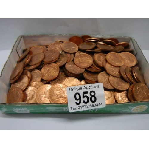 958 - A quantity of mainly uncirculated pre-decimal half pennies.